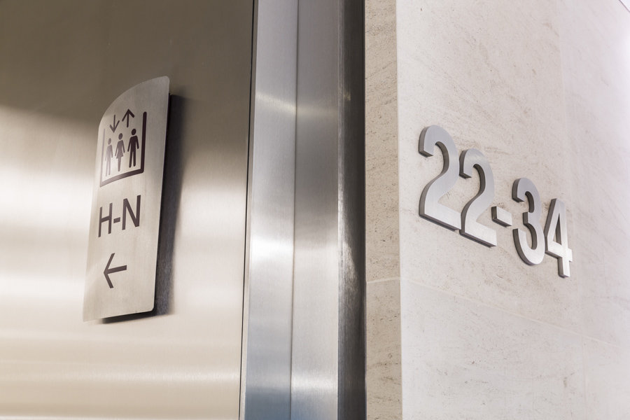 Floor level identification and direction signs within 20 Fenchurch St offices